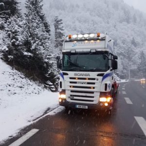 Skytrux lorry driving through snow