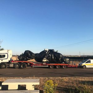 Skytrux transporting helicopter on lorry trailer